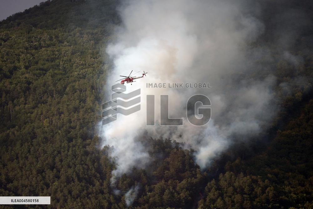 Air Rescue Operations During a Mountain Fire - Italy