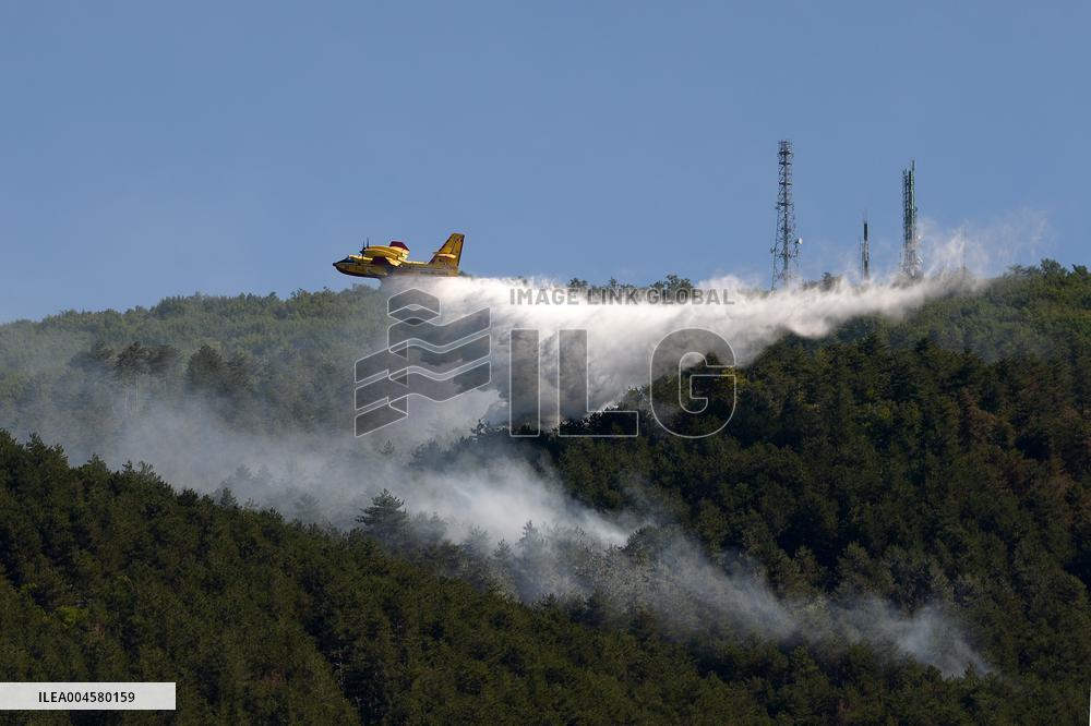 Air Rescue Operations During a Mountain Fire - Italy