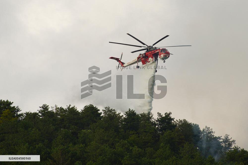 Air Rescue Operations During a Mountain Fire - Italy