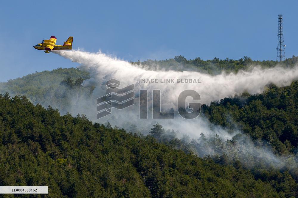 Air Rescue Operations During a Mountain Fire - Italy