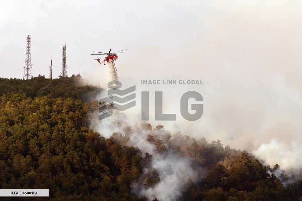 Air Rescue Operations During a Mountain Fire - Italy