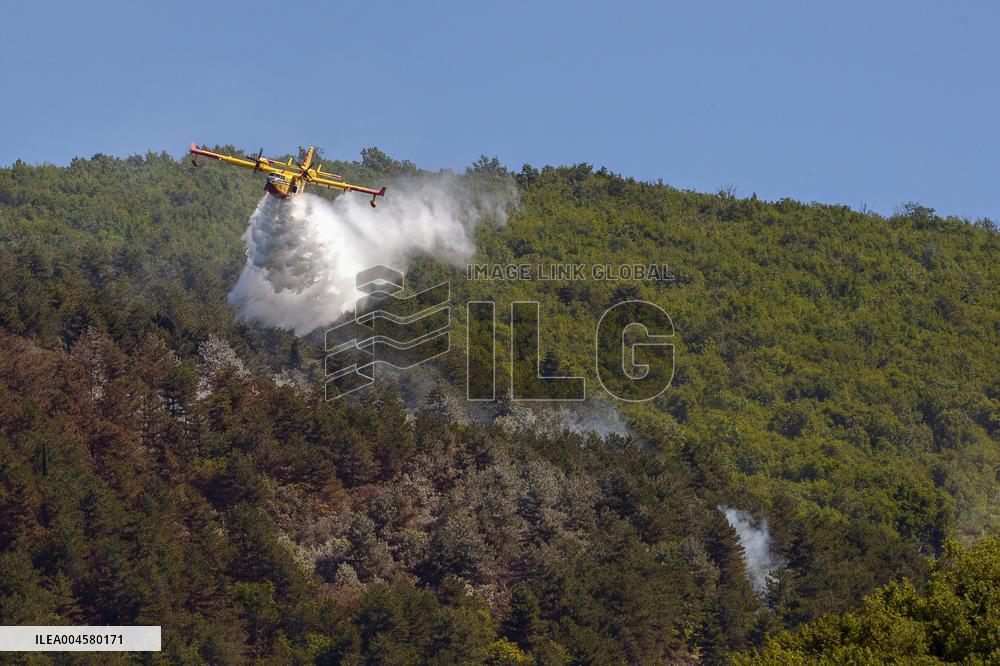 Air Rescue Operations During a Mountain Fire - Italy