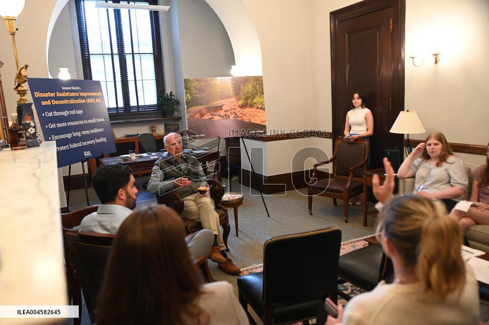 United States Senator Peter Welch (Democrat of Vermont) gives pen and pad on reformation of FEMA