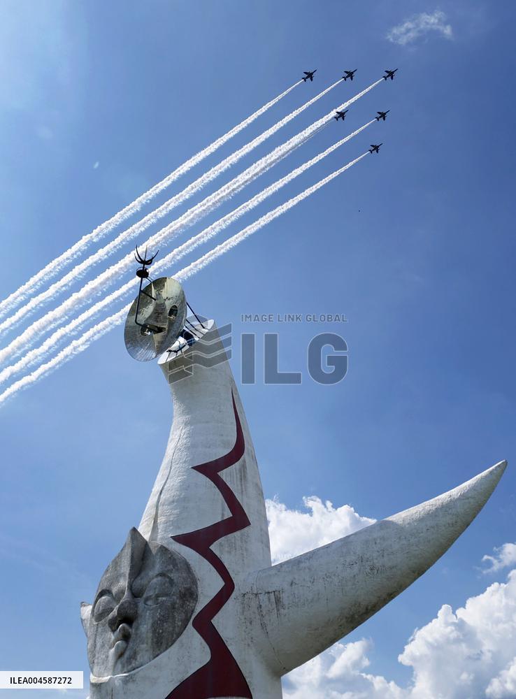 Blue Impulse aerobatic team flies over Osaka