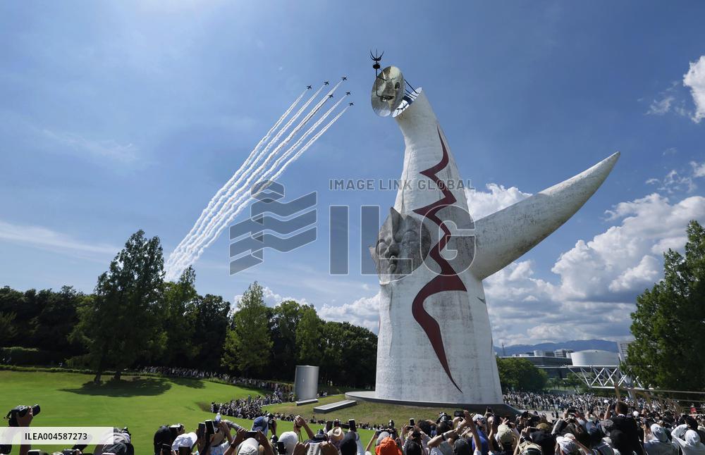 Blue Impulse aerobatic team flies over Osaka