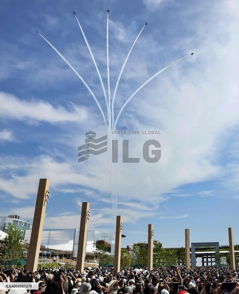 Blue Impulse aerobatic team flies over Osaka