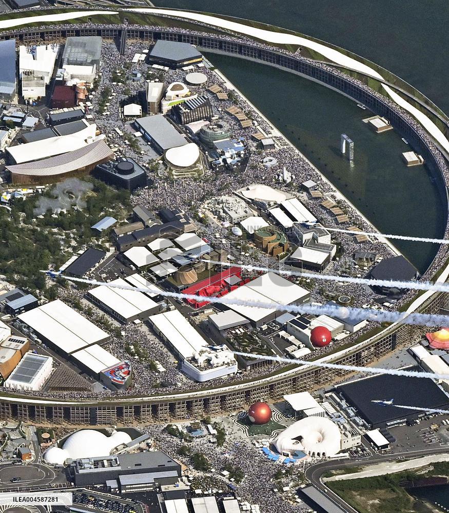 Blue Impulse aerobatic team flies over Osaka