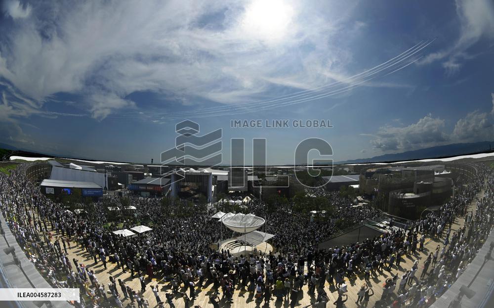 Blue Impulse aerobatic team flies over Osaka