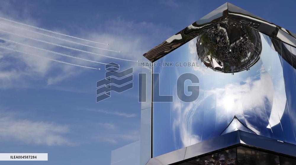 Blue Impulse aerobatic team flies over Osaka