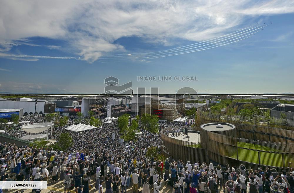Blue Impulse aerobatic team flies over Osaka