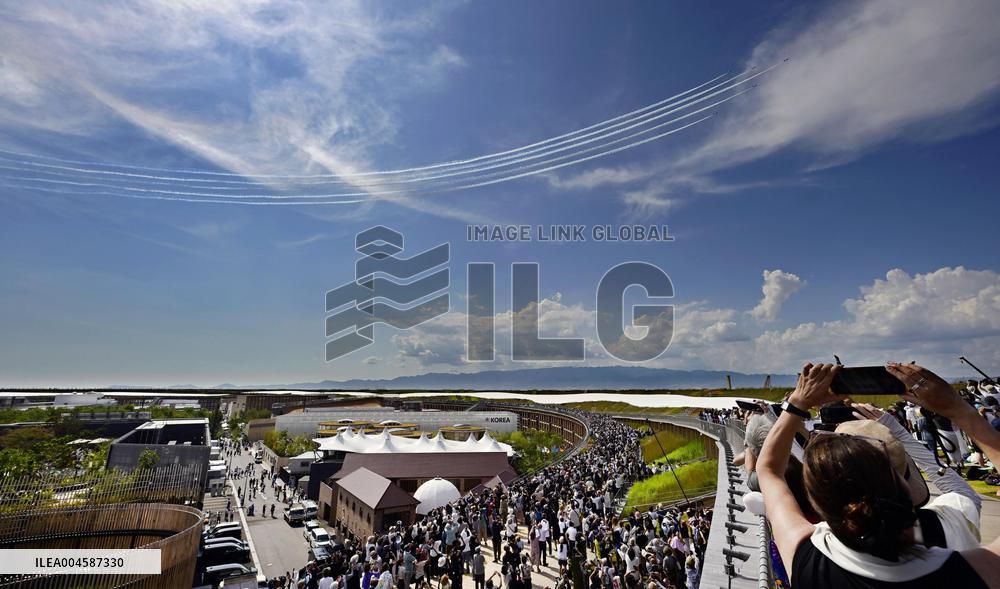 Blue Impulse aerobatic team flies over Osaka
