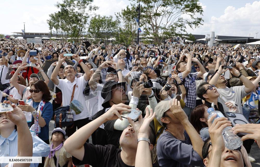 Blue Impulse aerobatic team flies over Osaka