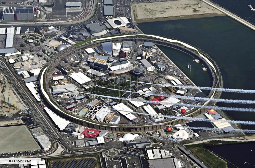 Blue Impulse aerobatic team flies over Osaka