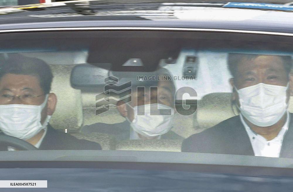 Japan's ex-emperor hospitalized for heart failure treatment