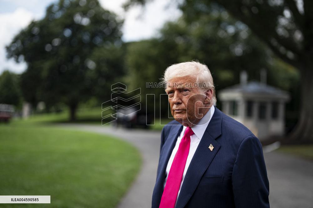 US President Donald Trump boards Marine One