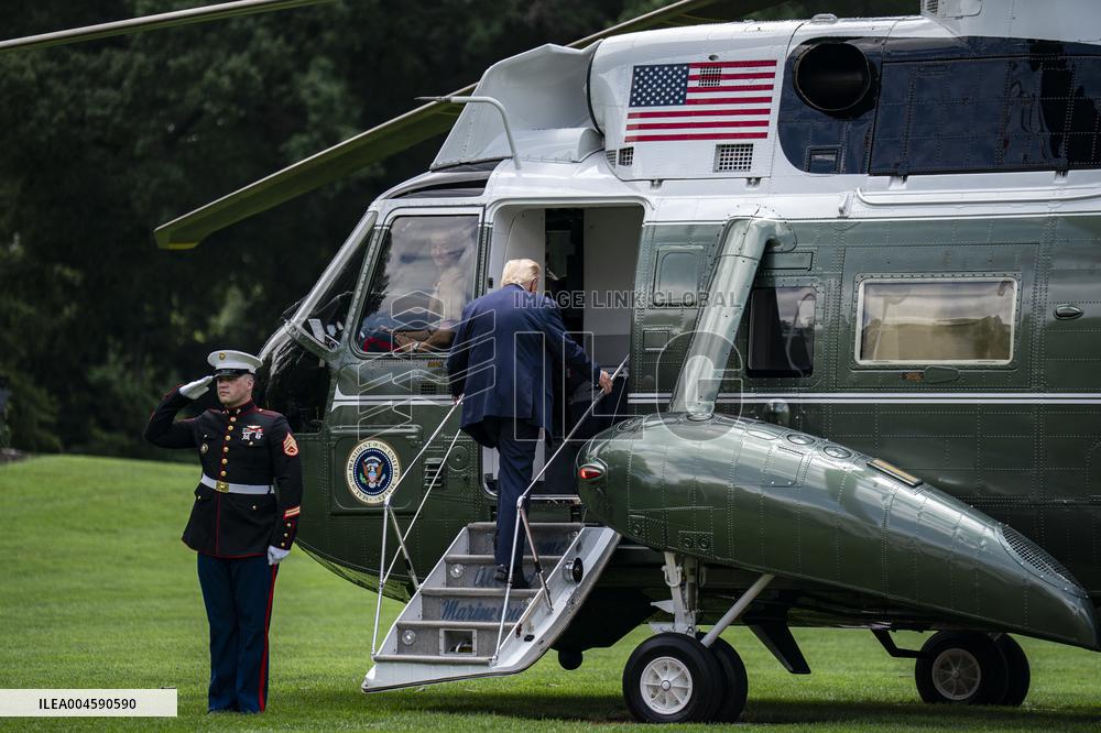 US President Donald Trump boards Marine One