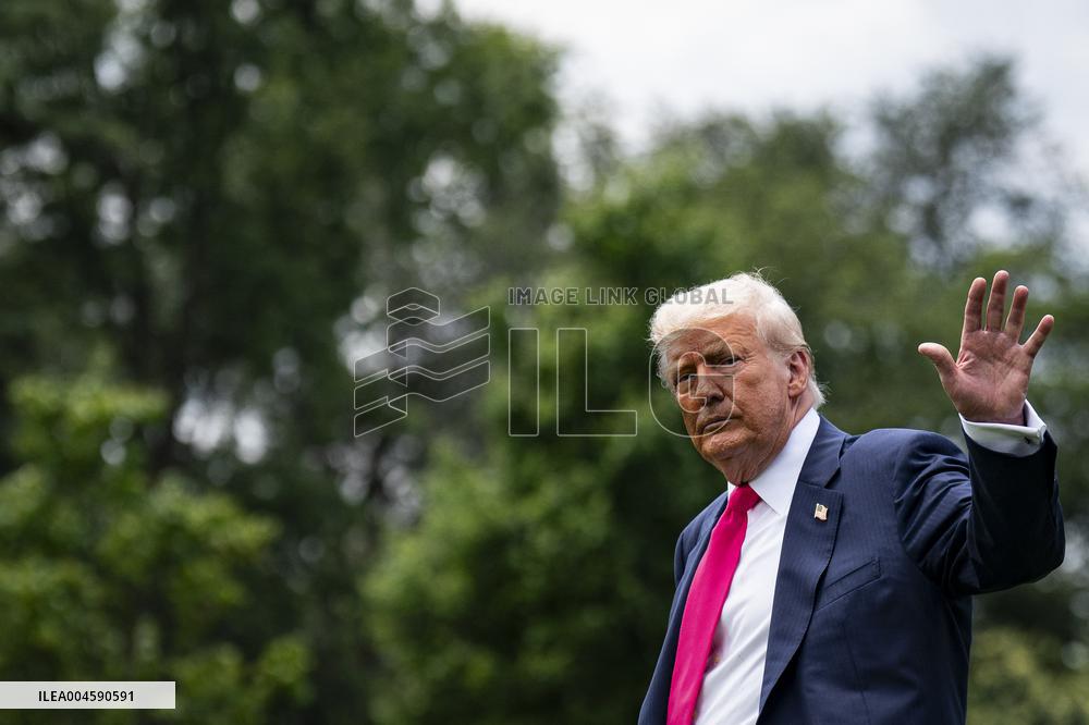 US President Donald Trump boards Marine One