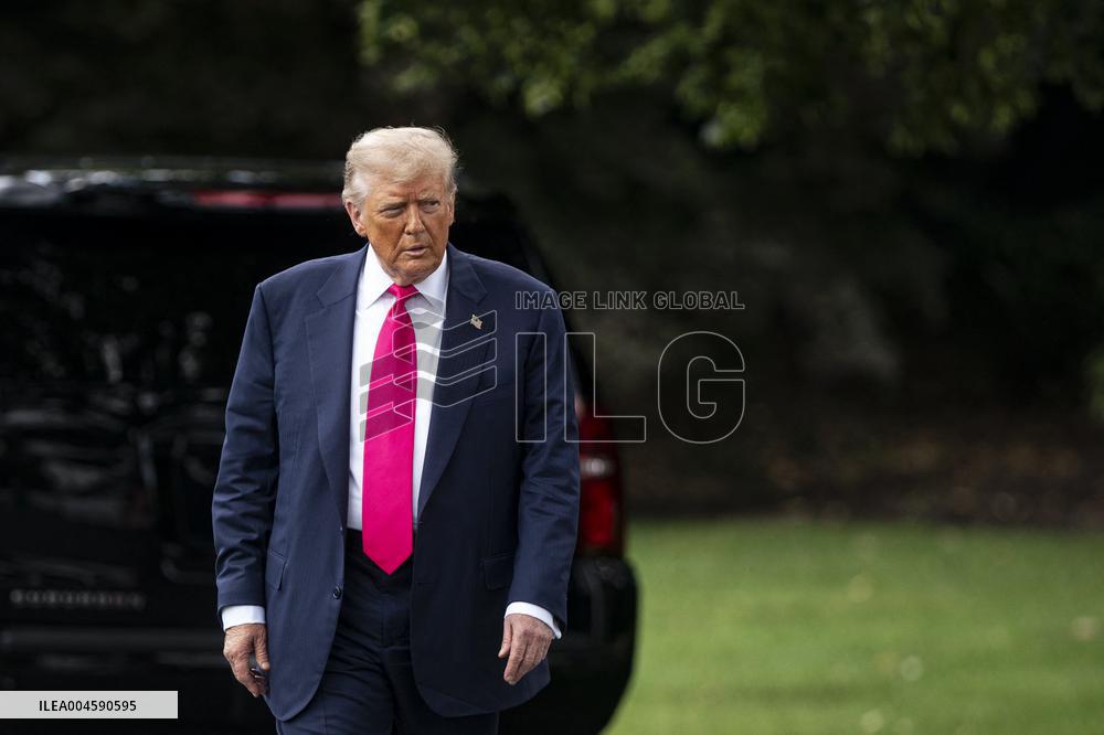 US President Donald Trump boards Marine One