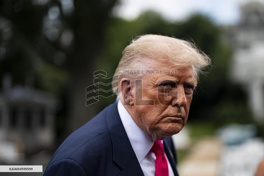 US President Donald Trump boards Marine One