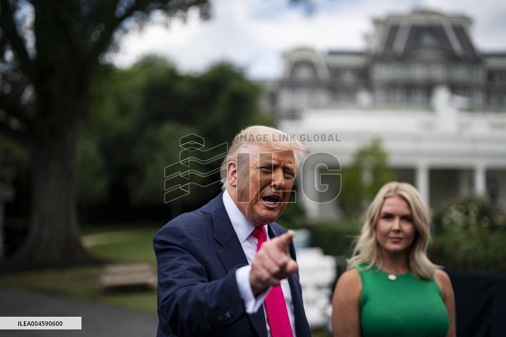 US President Donald Trump boards Marine One