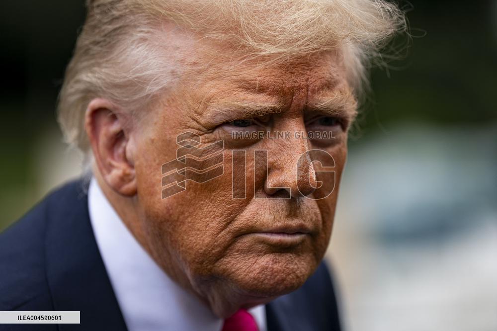 US President Donald Trump boards Marine One