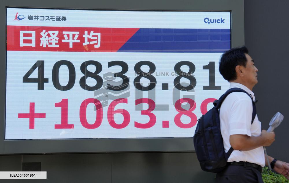 Tokyo stocks surge