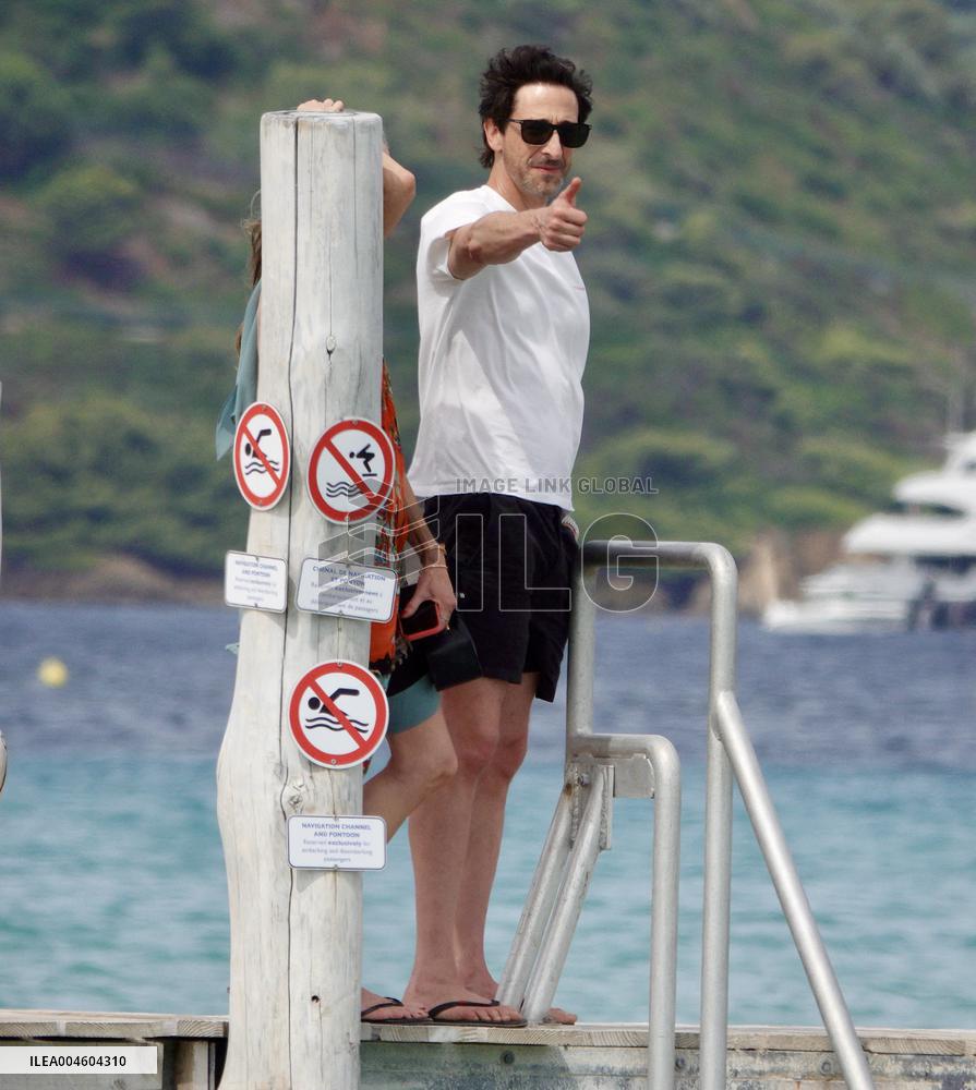 Adrien Brody and Georgina Chapman at Club 55 in Saint-Tropez - France
