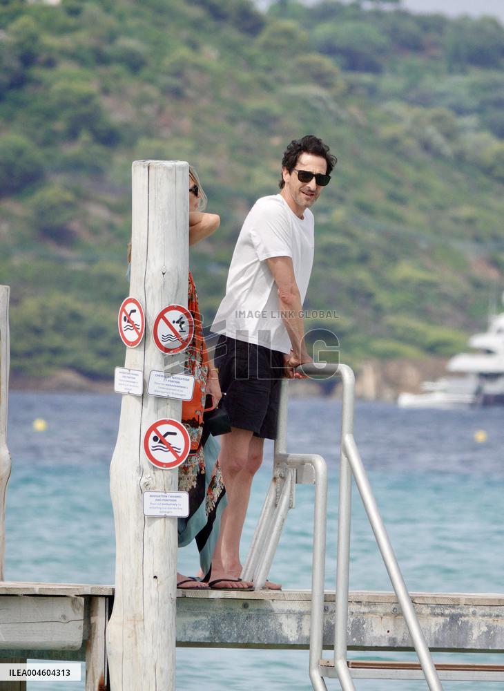 Adrien Brody and Georgina Chapman at Club 55 in Saint-Tropez - France