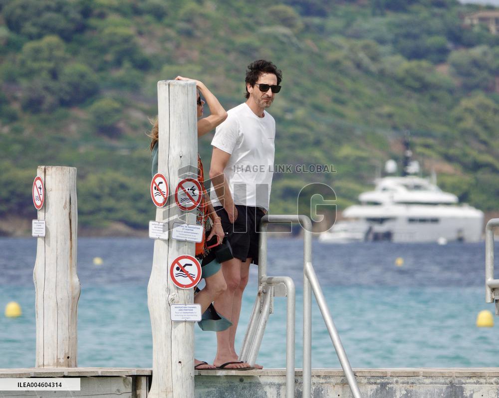 Adrien Brody and Georgina Chapman at Club 55 in Saint-Tropez - France