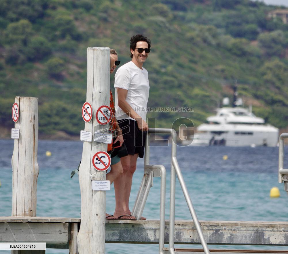 Adrien Brody and Georgina Chapman at Club 55 in Saint-Tropez - France