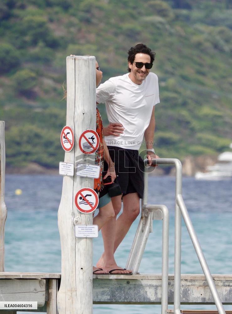 Adrien Brody and Georgina Chapman at Club 55 in Saint-Tropez - France