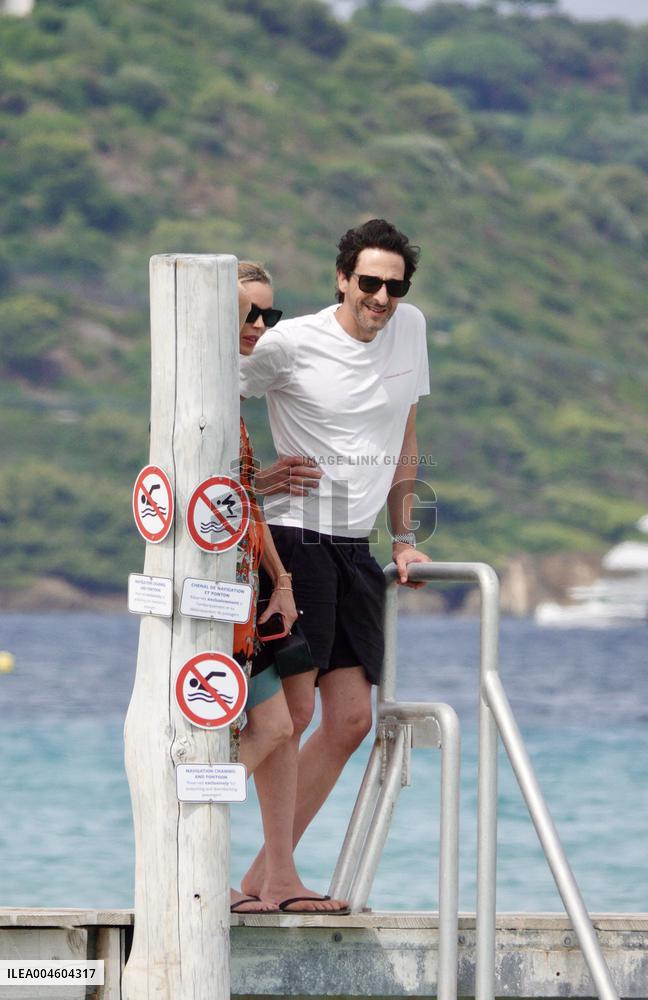 Adrien Brody and Georgina Chapman at Club 55 in Saint-Tropez - France