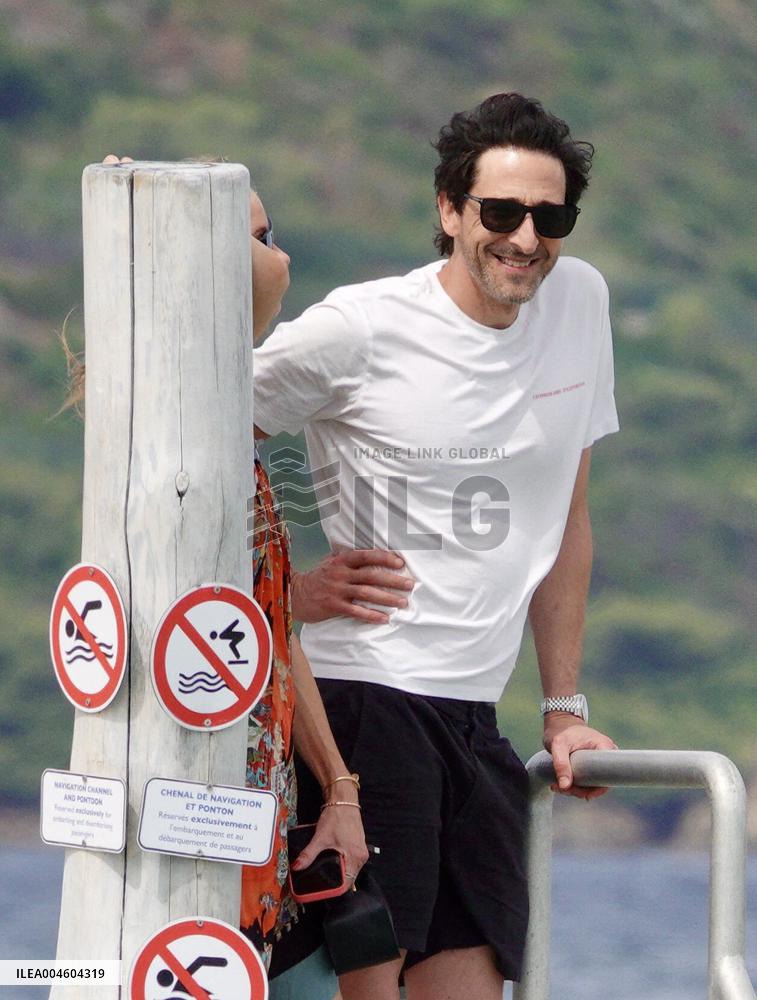 Adrien Brody and Georgina Chapman at Club 55 in Saint-Tropez - France