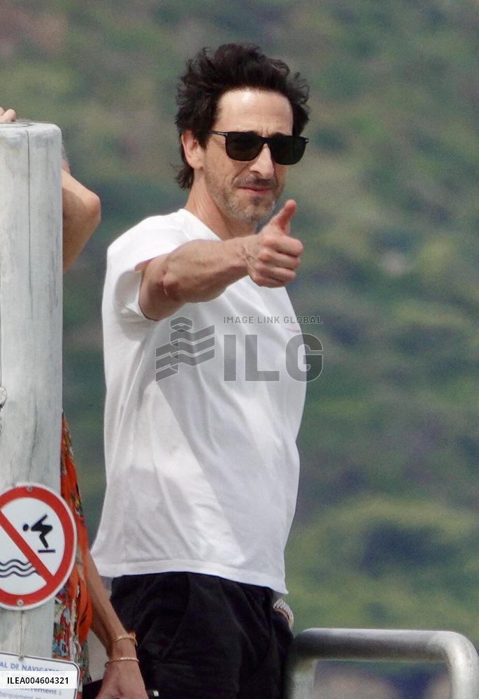 Adrien Brody and Georgina Chapman at Club 55 in Saint-Tropez - France