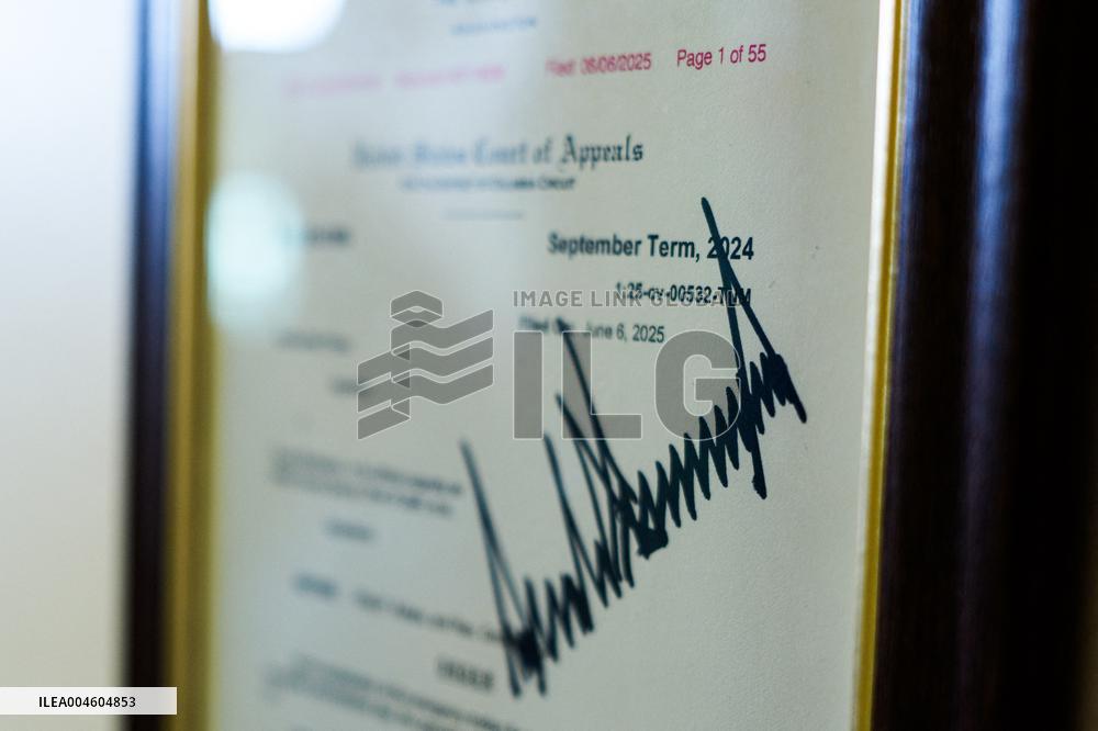 Trump-Signed Court Order Allowing Ban of Associated Press from Pool Displayed in Press Briefing Room of White House