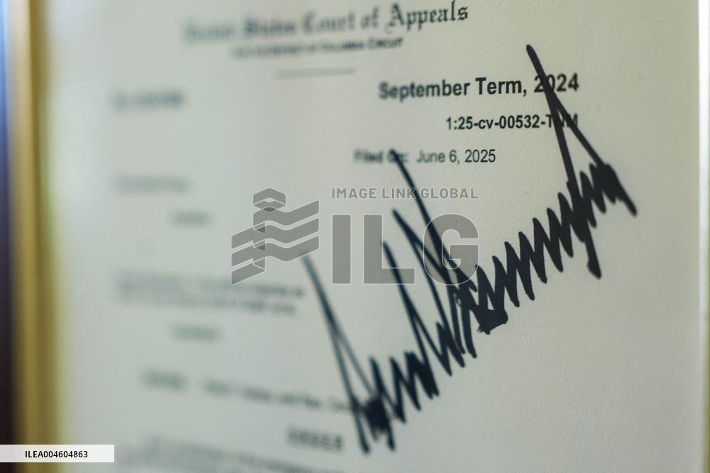 Trump-Signed Court Order Allowing Ban of Associated Press from Pool Displayed in Press Briefing Room of White House