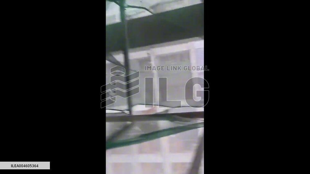 China: Construction Cradle Torn Off by Typhoon Winds Crashes Into Building in Guangdong