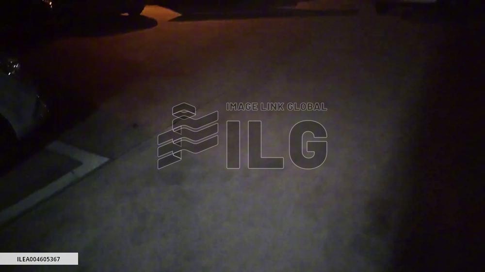 China: Cloud Formation Resembling Sniper Captured in Night Sky