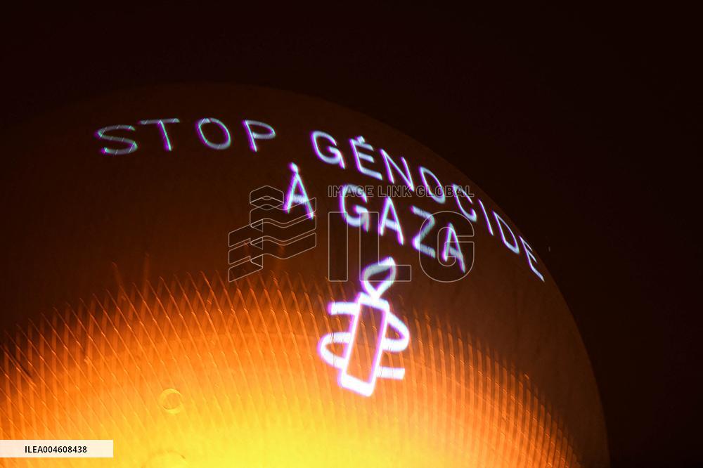 Amnesty International Action - "Stop genocide in Gaza" onto the Paris 2024 Olympic cauldron - Paris