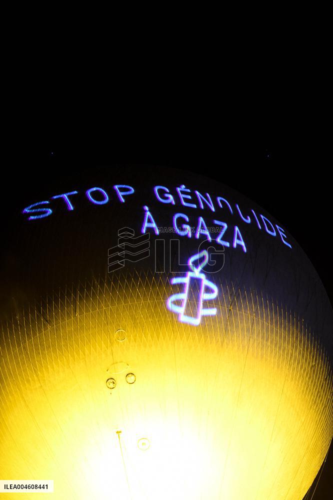 Amnesty International Action - "Stop genocide in Gaza" onto the Paris 2024 Olympic cauldron - Paris