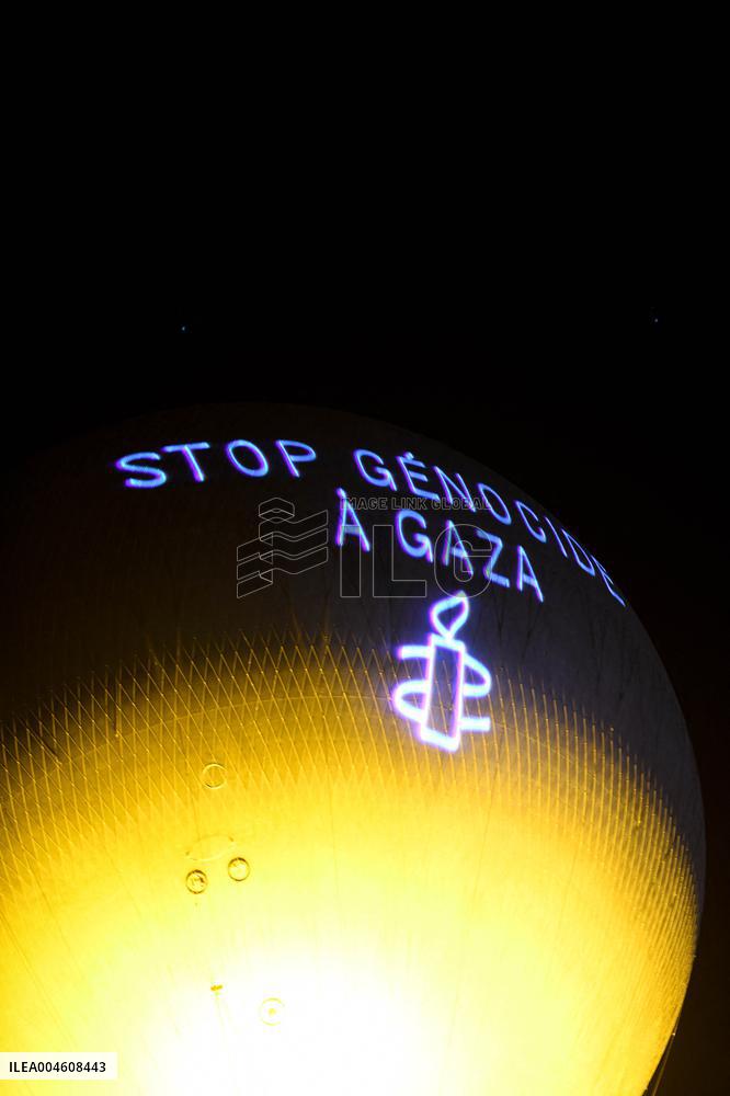 Amnesty International Action - "Stop genocide in Gaza" onto the Paris 2024 Olympic cauldron - Paris