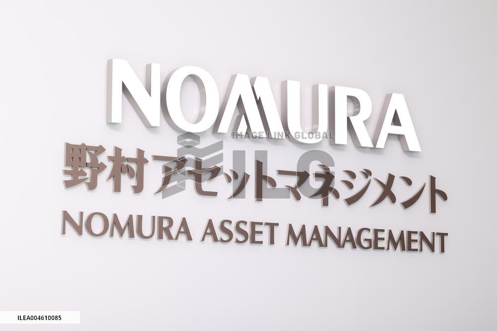 Nomura Asset Management signboard and logo