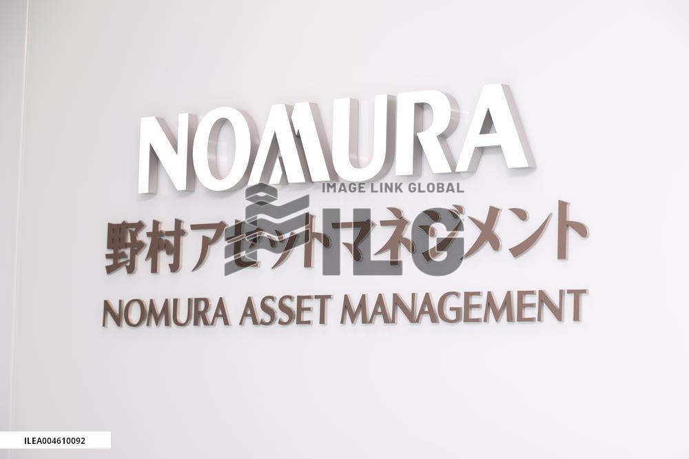 Nomura Asset Management signboard and logo