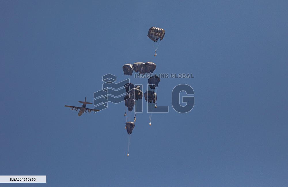 Military Aircraft Drops Humanitarian Aid on Northern Gaza