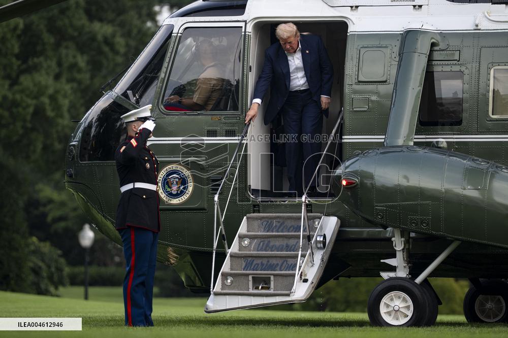 President Donald Trump Returns to the White House from United Kingdom Trip