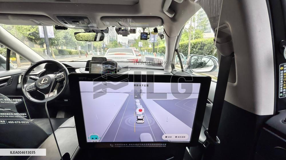 L4-level AI Autonomous Driving Car Experience Event at the 2025 WAIC in Shanghai