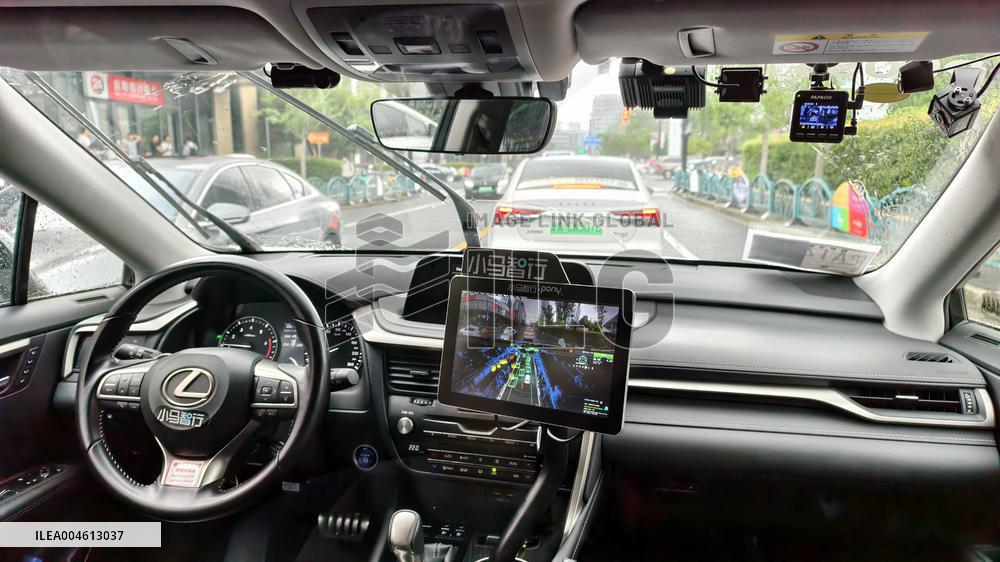 L4-level AI Autonomous Driving Car Experience Event at the 2025 WAIC in Shanghai