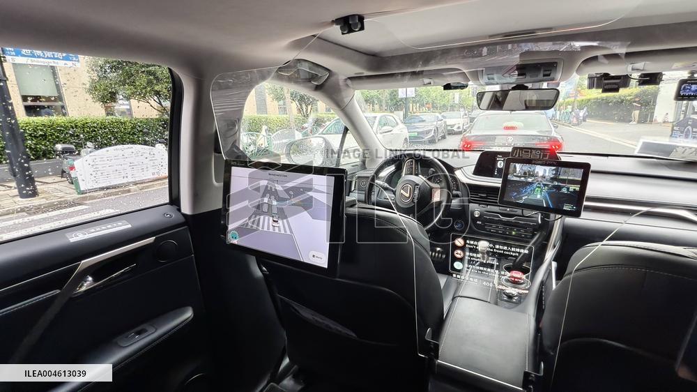 L4-level AI Autonomous Driving Car Experience Event at the 2025 WAIC in Shanghai