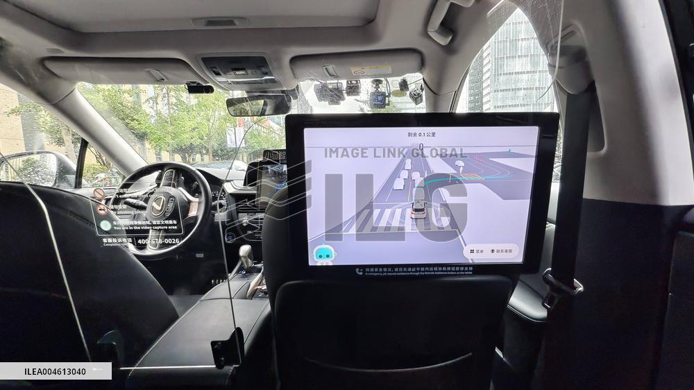 L4-level AI Autonomous Driving Car Experience Event at the 2025 WAIC in Shanghai