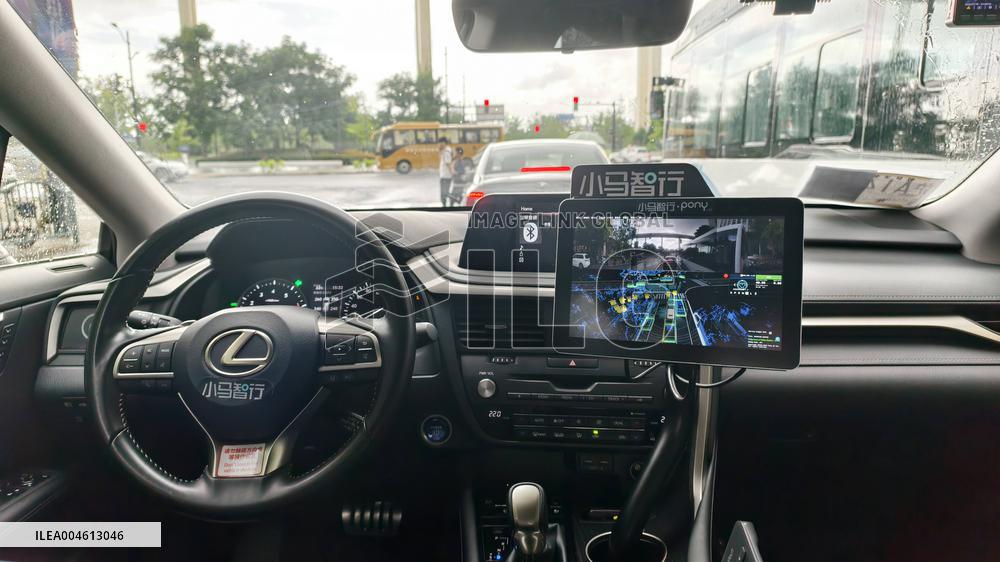 L4-level AI Autonomous Driving Car Experience Event at the 2025 WAIC in Shanghai